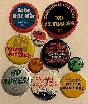 [Ten different YSA pinback buttons]