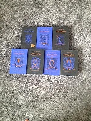 Imagen del vendedor de HARRY POTTER HOGWARTS HOUSE FIRST EDITION SET: RAVENCLAW (PHILOSOPHER'S STONE; CHAMBER OF SECRETS; PRISONER OF AZKABAN; GOBLET OF FIRE; ORDER OF THE PHOENIX; HALF-BLOOD PRINCE; DEATHLY HALLOWS) a la venta por Books for Collectors