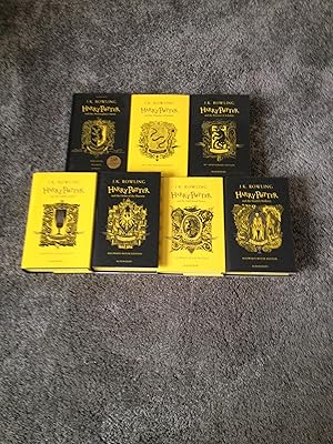 Seller image for HARRY POTTER HOGWARTS HOUSE FIRST EDITION SET: HUFFLEPUFF (PHILOSOPHER'S STONE; CHAMBER OF SECRETS; PRISONER OF AZKABAN; GOBLET OF FIRE; ORDER OF THE PHOENIX; HALF-BLOOD PRINCE; DEATHLY HALLOWS) for sale by Books for Collectors