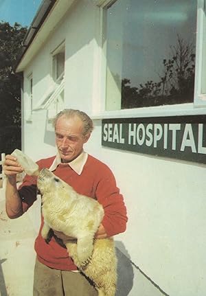 Bottle Feeding an Otter at Seal Sanctuary Cornwall Postcard