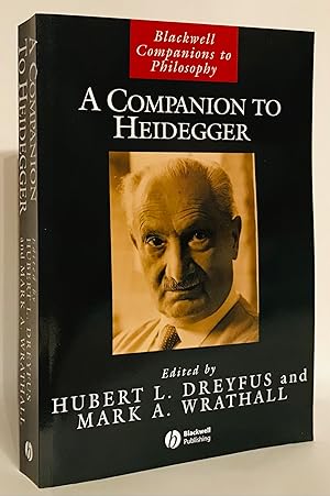 Seller image for A Companion to Heidegger. for sale by Thomas Dorn, ABAA