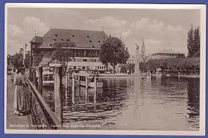 Bild des Verkufers fr AK Konstanz a. Bodensee, Konzil und Zeppelin-Denkmal, See, Steg, Boote, ungelaufen zum Verkauf von GAENSAN Versandantiquariat