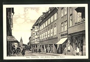 Ansichtskarte Saaz, Schillerstrasse mit Hotel Goldener Löwe und Kino Elysium