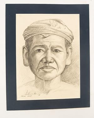 Portrait of a Balinese man in udeng headdress.