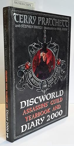 Immagine del venditore per Discworld Assassins' Guild Yearbook and Diary. 2000. Illustrated by Paul Kidby. PRESENTATION COPY FROM PRATCHETT. venduto da Addyman Books