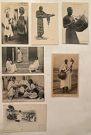 Seven early c20th B&W postcards of African musicians from Angola, Algeria, Morocco, Ghana, Guine ...