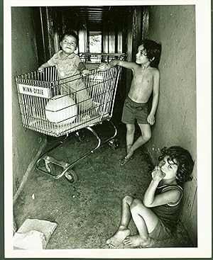 Juan Jose 1, in His Playpen and Next to Him Roberto 7; foreground Ruddy 5 Rendon (photograph)