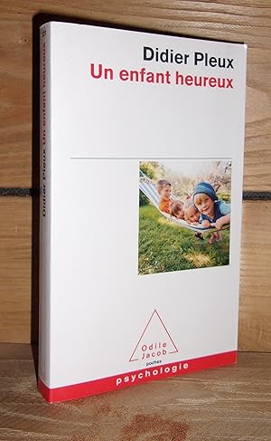 Seller image for UN ENFANT HEUREUX for sale by Planet's books