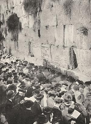 Imagen del vendedor de The Wailing Place of the Jews - The Wailing Place of the Jews, Jerusalem, where for many centuries pious Jews have wept over the stones of their lost inheritance. The lower courses of his sixty-feet wall are the work of the masons of Herod the King. On all the days of the week Jews may be found at their devotions on his spot. It is, however, on Friday afternoons and on the eve of a fast or feast day, as shown in the picture, that they assemble here in great numbers a la venta por Antiqua Print Gallery