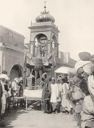 Immagine del venditore per The Mohurrum festival, Firozpur - A tabut, or model of the tombs of Hasan and Husain, the Shi'ah martyrs, from the Punjab, showing a representing of the burak, or fabulous winged animal which carried Muhammad from Jerusalem to Heaven. The whole structure is typical of the Shi'ah sect venduto da Antiqua Print Gallery