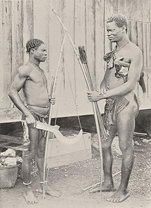 Lake Ntumba men and their weapons - It is only a tribe here and there that use bows an arrows, mo...