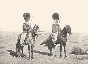 Seller image for Native Horsemen, Algeria - In Algiers the native tribes have to furnish contingents to the French army, and it is interesting to notice that in spite of the levelling effect of uniform and of the barrack life, the natives retain some of their old customs, e.g., that of covering the mouth for sale by Antiqua Print Gallery