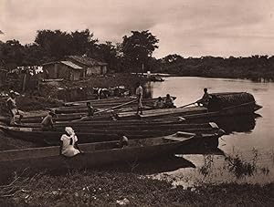 A street scene at Trinidad, the capital of the Beni Department. Indian canoes on the River San Juan