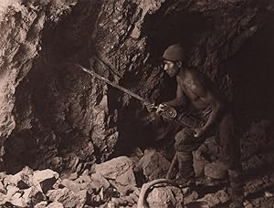 A miner of Pailaviri (Potosí). As in the days of yore, centures ago, Mount Potosí is traversed by...