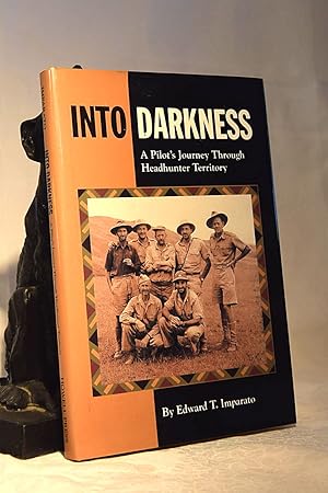 INTO DARKNESS. A Pilot's Journey Through Headhunter Territory