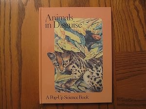 Immagine del venditore per Animals in Disguise (A Pop-Up Science Book including pull and lift tabs) venduto da Clarkean Books