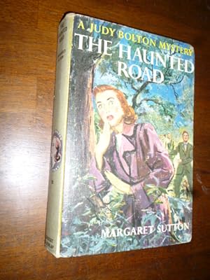 Seller image for The Haunted Road (Judy Bolton Mystery Stories) for sale by Gargoyle Books, IOBA