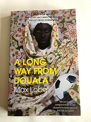 Seller image for A LONG WAY FROM DOUALA for sale by Happyfish Books
