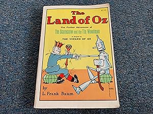 The Land of Oz: Being an Account of the Further Adventures of the Scarecrow and Tin Woodman. A Se...