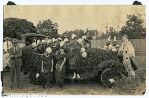 [Photograph]: Kenedy, Texas Art Car with Women and Clowns circa 1920s; Photograph by Dedrick in K...