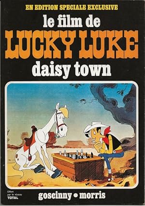 Image du vendeur pour Rare Lot Daisy Town, compos du Livre-Disque le Petit Mnestrel " Jolly Jumper, Jean-Marc Thibault raconte Lucky Luke, le Grand Film de Morris et Goscinny " + la bande dessine en dition spciale exclusive, le Film de Lucky Luke : Daisy Town, en tirage hors commerce, spcialement ralis pour le rseau Total. mis en vente par Librairie Victor Sevilla