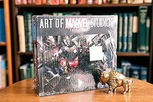 Bild des Verkufers fr Art of Marvel Studios (The Art of the Marvel Cinematic Universe) Four volumes in slipcase; The Art of Captain America; The Art of Thor; The Art of Iron Man; The Art of Iron Man 2 zum Verkauf von BISON BOOKS - ABAC/ILAB