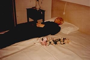 Photograph of Marc Chagall on his deathbed. Full body.