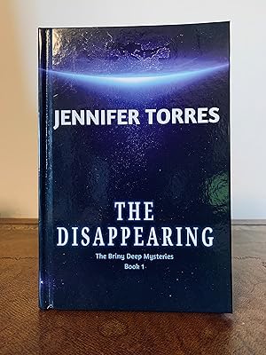 Seller image for The Disappearing [The Briny Deep Mysteries Book 1] for sale by Vero Beach Books