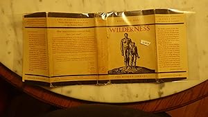 Seller image for WILDERNESS by Rockwell Kent, STATED 1ST MODERN LIBRARY EDITION #182 1930 with Second Preface, Journal of quiet adventure in Alaska, Beige & BLACK ILLUSTRATED Dustjacket OF MAN STANDING WITH BOY & TITLED IN RED, Lavishly Illustrated incredible deep, rich black plates for sale by Bluff Park Rare Books