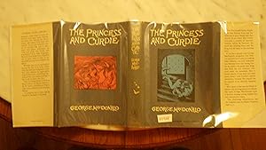 Seller image for The Princess and Curdie (Looking Glass Library Series #12) BY GEORGE MACDONALD, CHARMING Illus. by Helen Stratton. in Illustrated Grey, blue & black dustjacket, the second part of MacDonald's story about the Princess Irene and Curdie, the miner's son. Curdie hears that Irene for sale by Bluff Park Rare Books