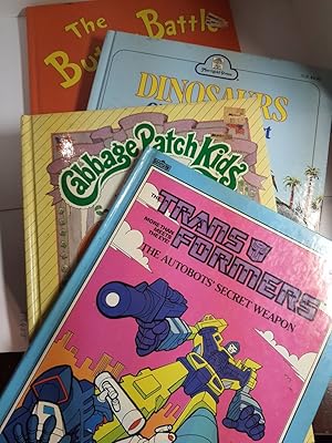 Seller image for Four Childrens Books: 1. Trans Formers, the Autobots Secret 2. Cabbage Patch Kids, the Shyest Kid in the Patch 3. Dinosaurs Giants of the Past 4. Dr. Seuss- the Butter Battle Book for sale by Hammonds Antiques & Books