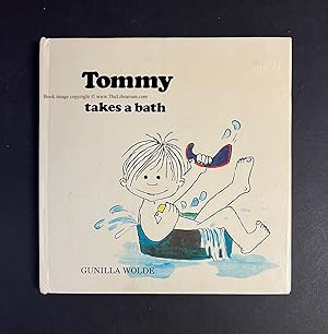 Tommy takes a bath