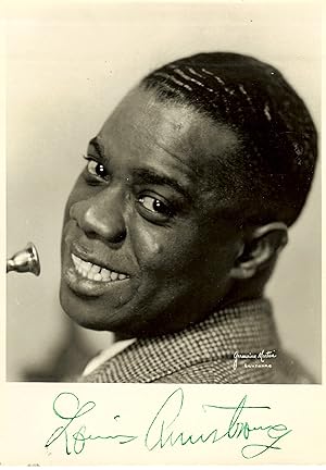 LOUIS ARMSTRONG ~~ AN ATTRACTIVE SIGNED PHOTOGRAPH OF 'SATCHMO'