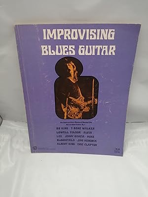 Bild des Verkufers fr Improvising Blues Guitar: An instruction Manual Based on Recorded Solos (Included 3 vinilos 33 rpm lessons 1 - 37) zum Verkauf von Libros Angulo