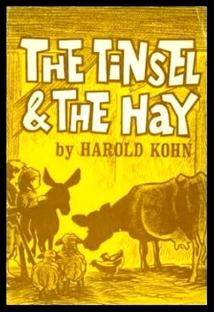 THE TINSEL AND THE HAY