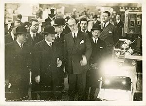 Seller image for Louis ROLLIN visite le Salon d'Organisation Commerciale 1931" Photo de presse originale Henri MANUEL (1931) for sale by Mad-Museum