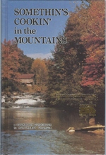 Seller image for Somethin's Cookin' in the Mountains: Discover the Northeast Georgia Mountains: a Cookbook Guidebook to Northeast Georgia for sale by Mom's Resale and Books