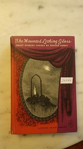 Seller image for The Haunted Looking Glass. ANTHOLOGY Ghost Stories Chosen and Illustrated Wonderfully Creepy Drawings By Edward Gorey Looking Glass Library#17, ,Gorey illustration on title page of all 12 stories. Dust illustrated by Gorey, Ghost stories by Algernon Blackwood, Harvey, for sale by Bluff Park Rare Books