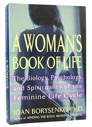 Seller image for A WOMAN'S BOOK OF LIFE The Biology, Psychology, and Spirituality of the Feminine Life Cycle for sale by Rare Book Cellar