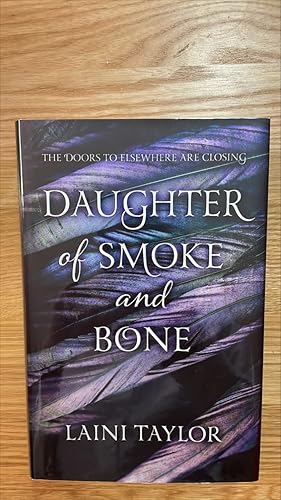 Imagen del vendedor de Daughter of Smoke and Bone. Signed, lined and dated UK first edition, first printing a la venta por Signed and Delivered Books