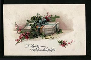 Bild des Verkufers fr Knstler-Ansichtskarte Herzlichste Weihnachtsgrsse, Geschenk mit Schleife und Kleeblttern zum Verkauf von Bartko-Reher