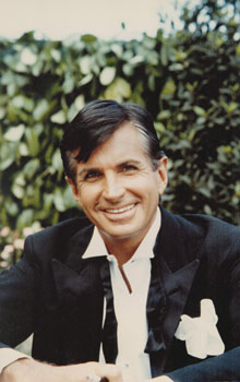 Original large format close-up color photograph of George Hamilton at Cannes.