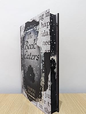 Imagen del vendedor de The Book Eaters (Signed First Edition with sprayed edges) a la venta por Fialta Books