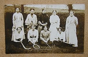 A Charming Group Portrait of Young Women, some with Sporting Equipment.