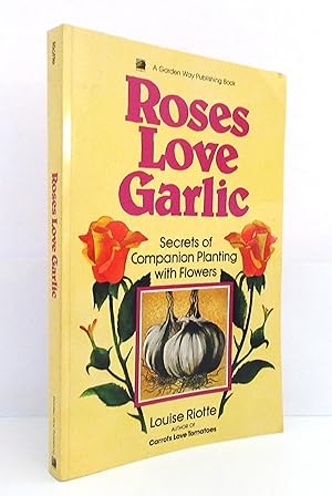 Seller image for Roses Love Garlic: Secrets of Companion Planting with Flowers for sale by The Parnassus BookShop