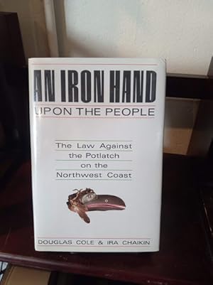 Seller image for An Iron Hand Upon the People : The Law Against the Potlatch on the Northwest Coast for sale by Stone Soup Books Inc