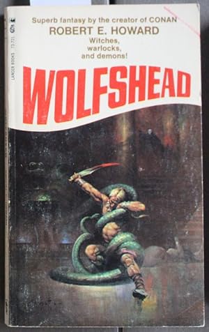 Image du vendeur pour WOLFSHEAD. [Lancer Books #73-721 ); >>> FRANK FRAZETTA Cover; >> Includes; The Black Stone; The Valley of the Worm; Wolfshead; The Fire of Asshurbanipal; The House of Arabu; The Horror from the Mound; The Cairn on the Headland mis en vente par Comic World