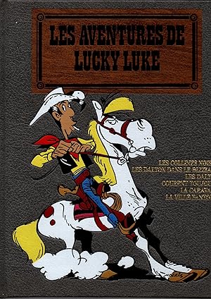 Image du vendeur pour Les aventures de Lucky luke.Reliure comportant 5 histoires.-Les collines noires.-Les Dalton dans le blizzard.-Les Dalton courent toujours.-La caravane.-La ville fantome. mis en vente par JP Livres