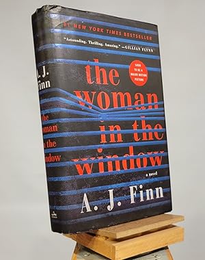 Imagen del vendedor de The Woman in the Window: A Novel a la venta por Henniker Book Farm and Gifts