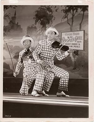 Bild des Verkufers fr Singin' in the Rain (Original photograph of Gene Kelly and Donald O'Connor from the 1952 film) zum Verkauf von Royal Books, Inc., ABAA